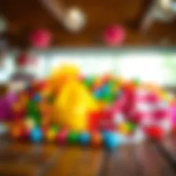 A vibrant assortment of oversized colorful candies displayed on a rustic wooden table